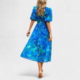 Clara - Elegantna Midi Haljina s Cvjetnim Uzorkom
